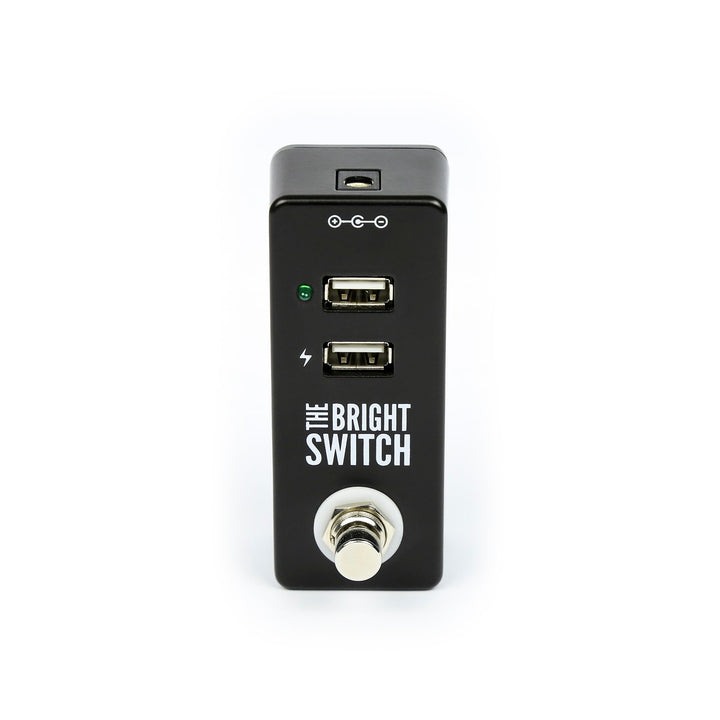 The Bright Switch pedal by Rock Stock, equipped with a USB port for powering a bright light that effectively illuminates a pedalboard. An indispensable tool for guitarists to conveniently manage and adjust their sound settings, even in low-light stages.