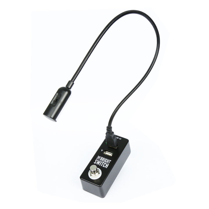 The Bright Switch pedal by Rock Stock, equipped with a USB port for powering a bright light that effectively illuminates a pedalboard. An indispensable tool for guitarists to conveniently manage and adjust their sound settings, even in low-light stages.