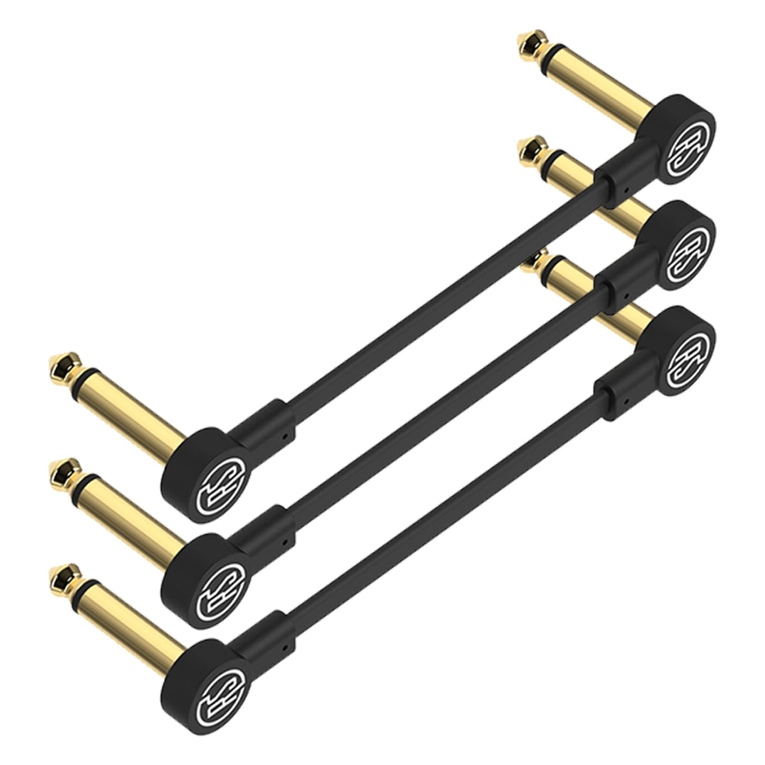 Flat Patch Cables by Rock Stock, ribbon patch cables with ultra-thin right-angle connectors for guitar pedalboards. Gold-plated tips, oxygen-free copper conductors, and braided shielding ensure clear signal and durability. Available in multiple lengths.